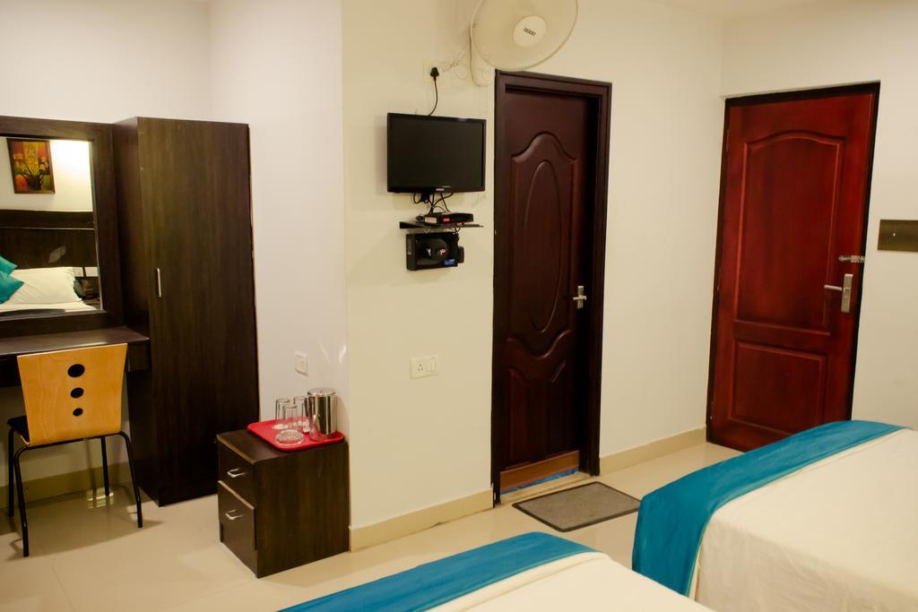 The Signature Inn Bangalore Phòng bức ảnh