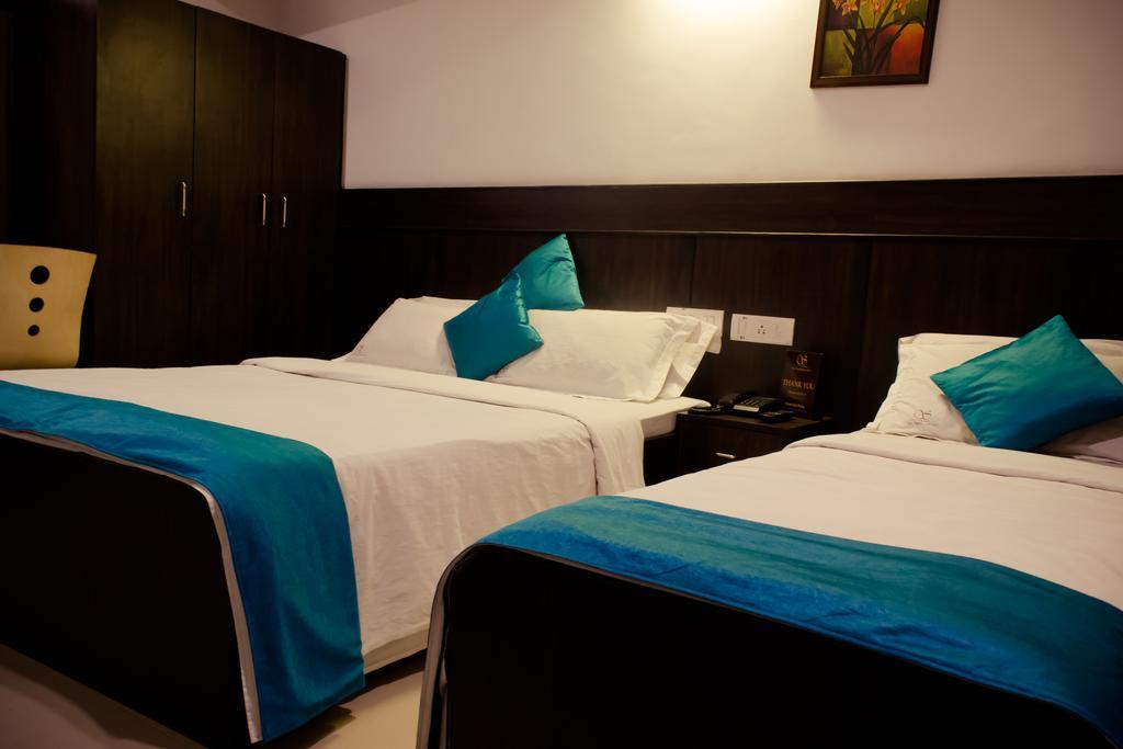 The Signature Inn Bangalore Phòng bức ảnh