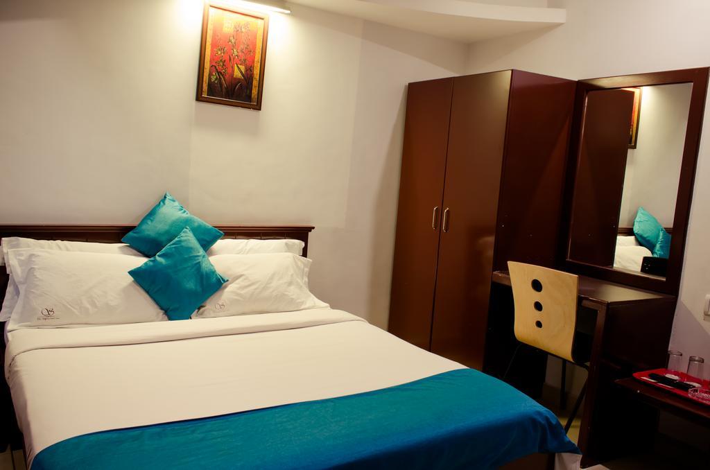 The Signature Inn Bangalore Phòng bức ảnh
