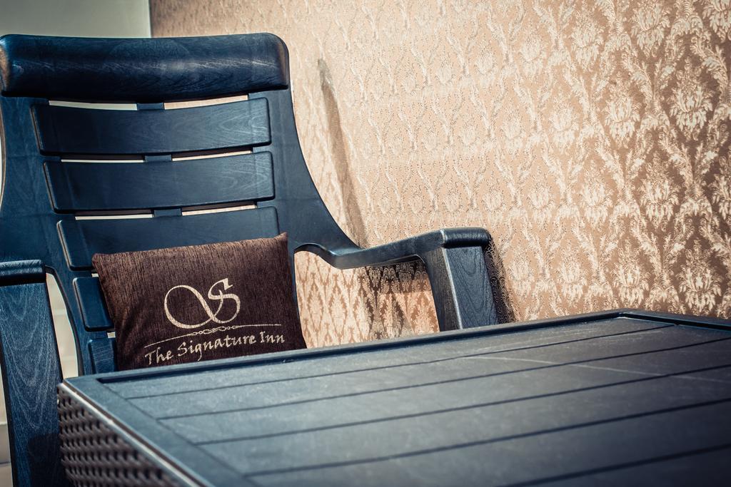 The Signature Inn Bangalore Phòng bức ảnh