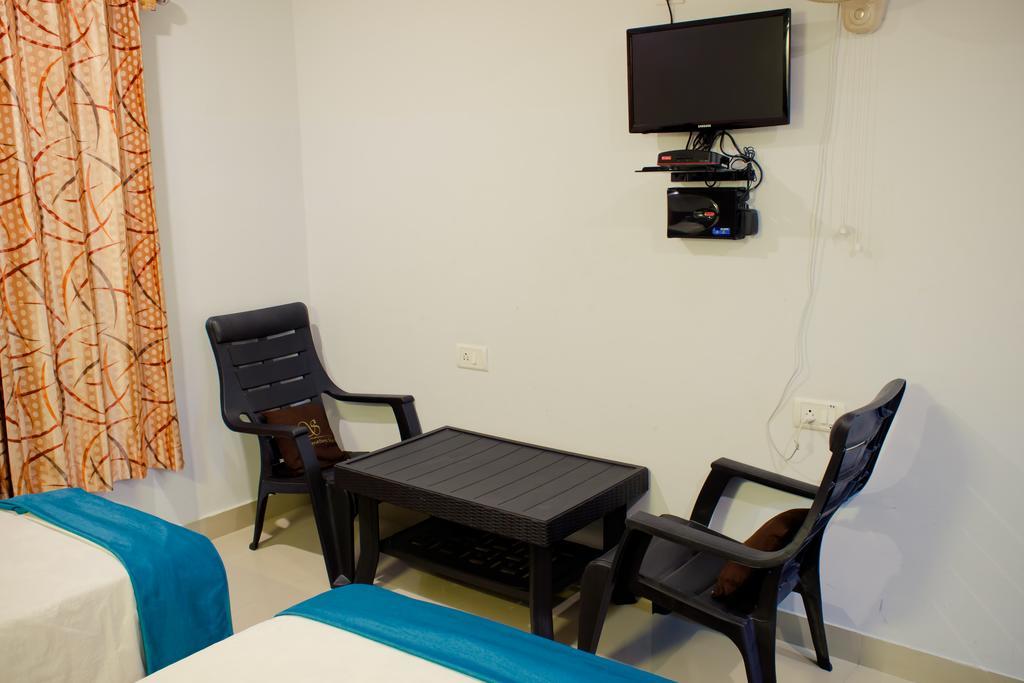 The Signature Inn Bangalore Phòng bức ảnh