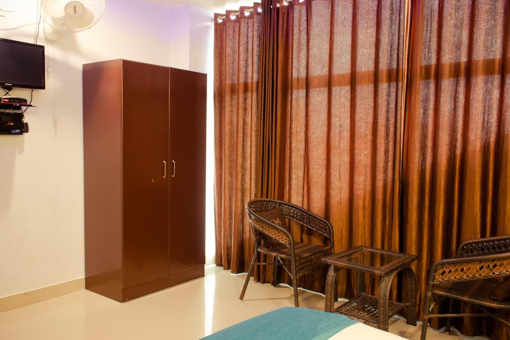 The Signature Inn Bangalore Phòng bức ảnh