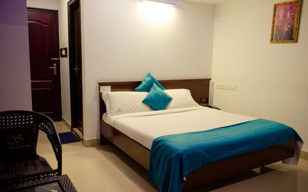The Signature Inn Bangalore Phòng bức ảnh